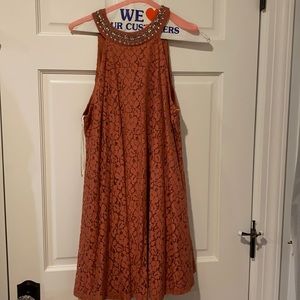 Lace dress with high neck with button back